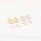 Pearl and heart oorbellen